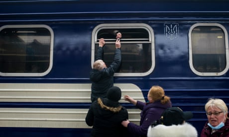 ‘It might be the last chance to get out’: citizens flee Kyiv as assault intensifies