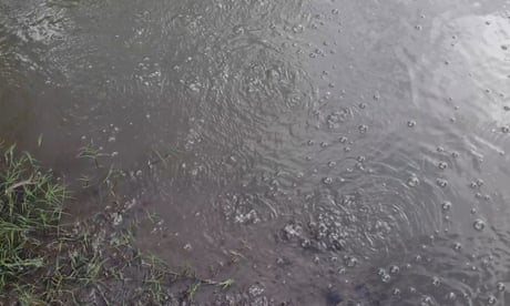 ‘Like a boiling broth’: concerns after video of gas seep in Queensland river emerges