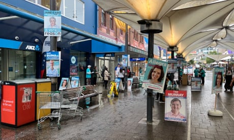 ‘The poor bugger belongs to the wrong party’: voters cast early ballots in two key Sydney seats