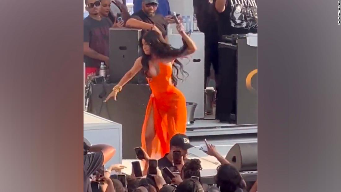 A concertgoer threw a drink at Cardi B while she was performing on stage, so she fought back