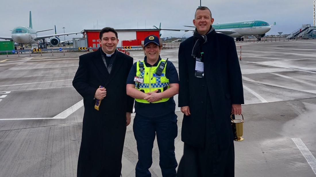 Airport falls silent as priest blesses planes