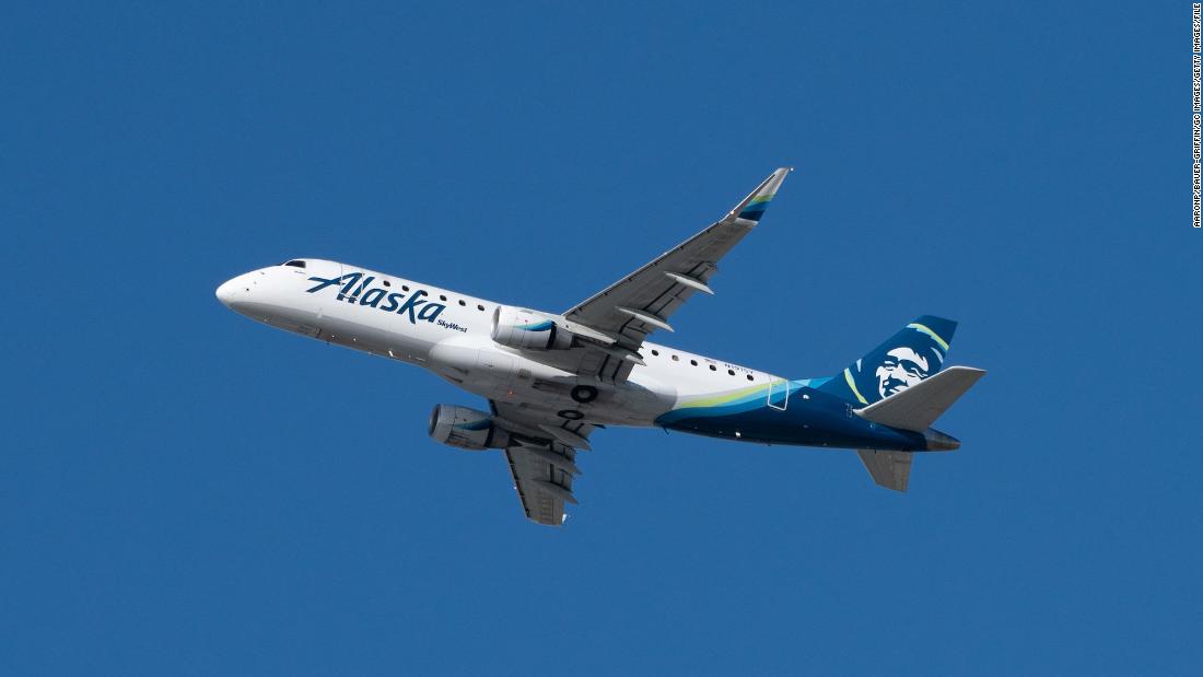 An off-duty pilot tried to disrupt an Alaska Airlines flight's engines before being subdued, airline says