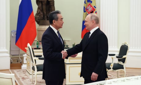 China and Russia reaffirm close ties as Putin meets top diplomat