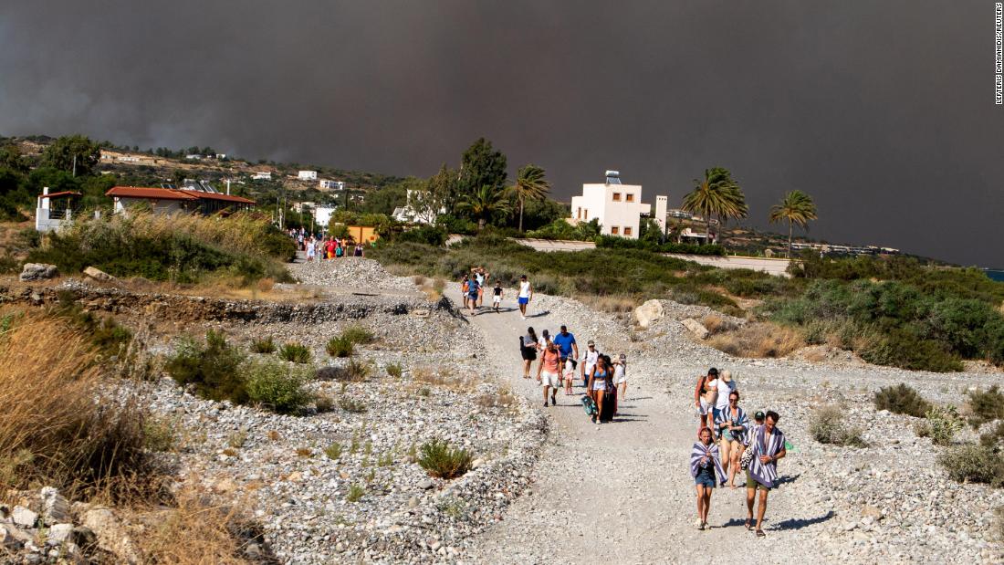 Greece evacuates thousands of tourists in Rhodes as wildfire burns