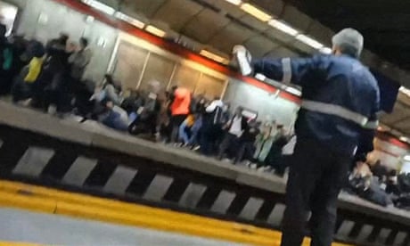Iranian police open fire at Tehran metro station and beat women on train
