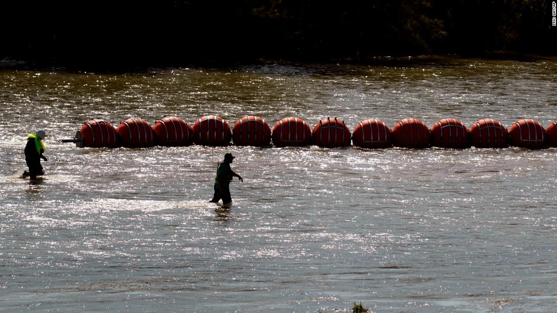 Justice Department planning legal action against Texas over floating border barrier