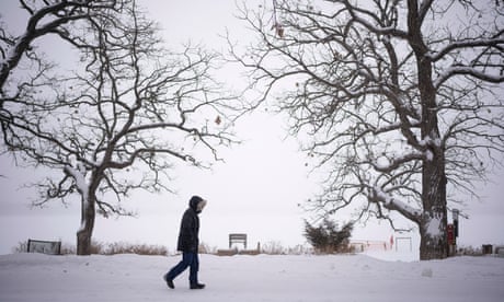 Midwest and north-east US brace for powerful storm and possible tornadoes