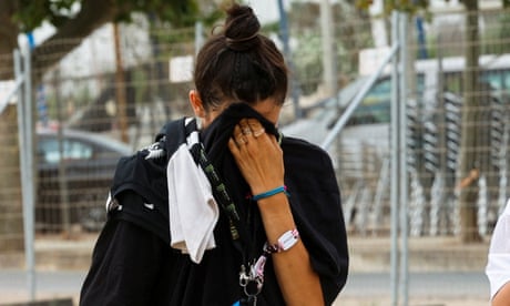 One dead and dozens hurt as stage collapses in high winds at Spanish festival