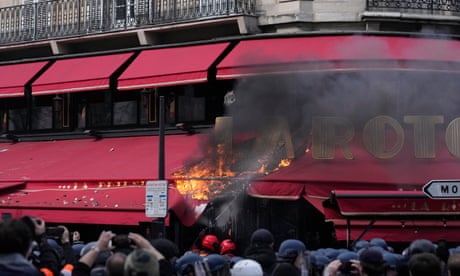 Paris brasserie favoured by Macron set alight as pension protests continue