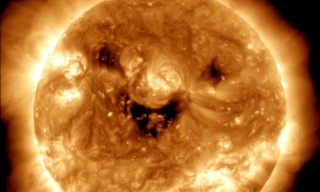 Ray of joy: Nasa captures image of the sun �smiling�