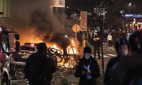 Rotterdam police open fire as Covid protest turns into ?orgy of violence?