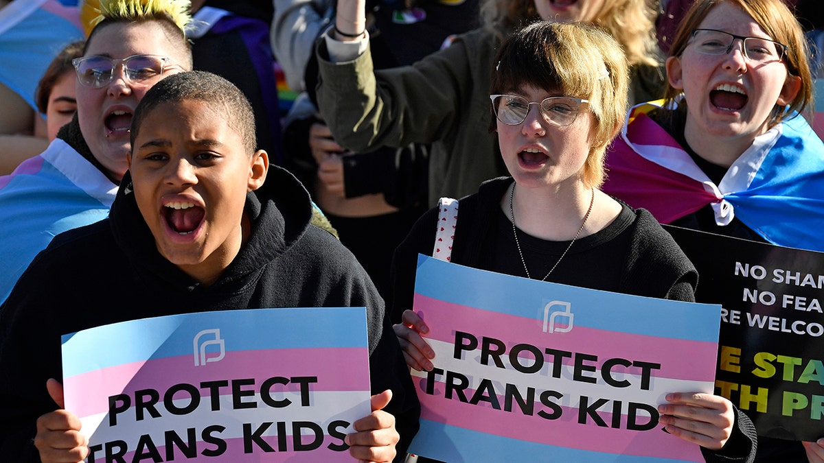 School district bans trans athletes from girls' sports as state defies Trump, sparking loud pro-trans chants