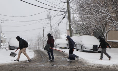 Storm blankets US north-east in snow as millions face ?disruptive? winter weather