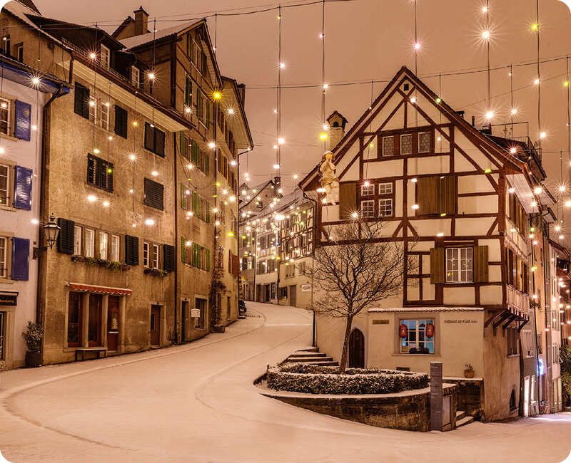 Switzerland's Festive Christmas Cities: Winter Magic Unveiled for Travelers to Discover Heartwarming Journeys, Funi Fondue Adventures, Historic Railcar Excursions, St. Gallen Tours and More
