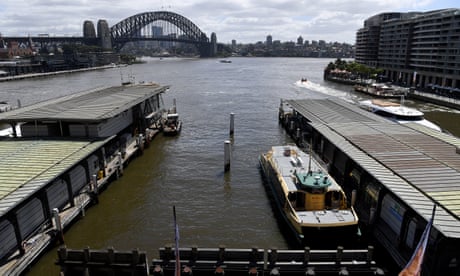 Sydney Harbour turns brown as authorities warn against swimming after floods