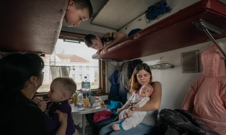 The people who keep the refugee trains running out of Ukraine - photo essay