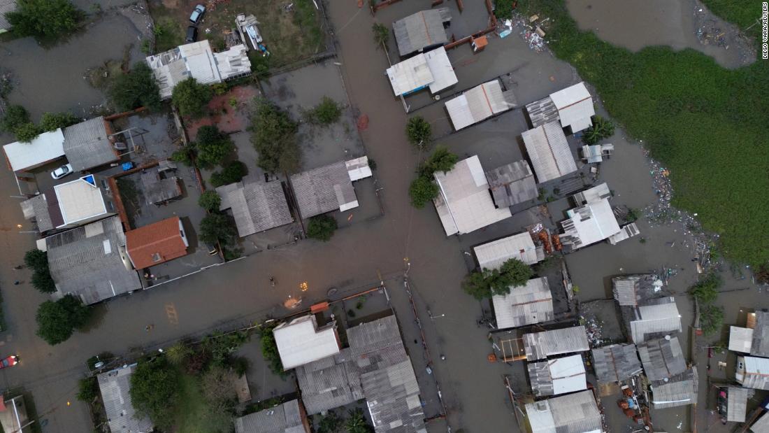 Twelve dead and others missing as cyclone hits southern Brazil