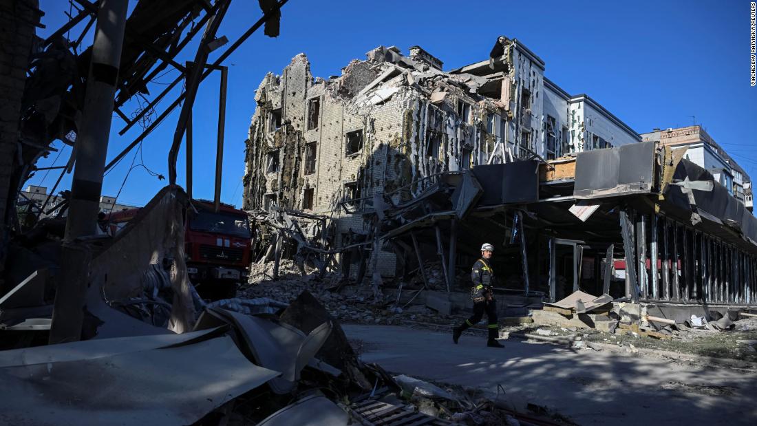 Twin Russian strikes on Ukrainian city kill civilians, then hit rescuers, official says