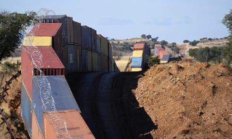 US government sues Arizona over shipping container wall on Mexico border