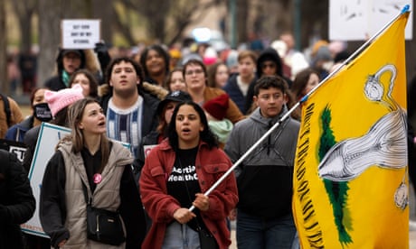 Women’s March draws thousands across US after Roe v Wade overturned